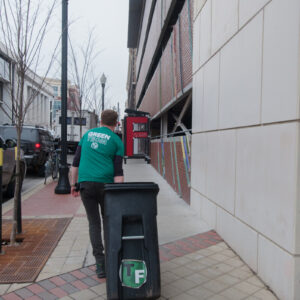 John Taube, a member of the Green Team transports food to take to the farm and compost on Saturday, March 2, 2019.  (Photo by Stephen Bybee)